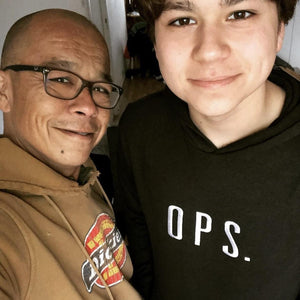 Father and son wearing OPS Hoodie with a positive review from Trustpilot